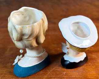 This lot features a pair of vintage lady head vases by Inarco & Nippon, circa 1950s. The largest measures, 5.5” H. 


