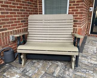 Outdoor rocking bench