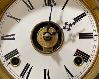 E. N. Welch Mfg Co “Colby Wringer” circa 1883 black walnut case wall clock