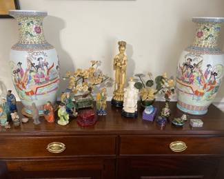 Asian decor items including two jade floral items, figurines, and small boxes 
