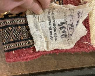 Hand-knotted made in Pakistani wool Bokhara-style rug in salmon and black 48” x 32”