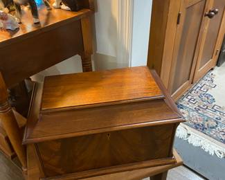 Lovely wooden small chest with key, made in Winchester, VA sitting on a vintage rustic bench