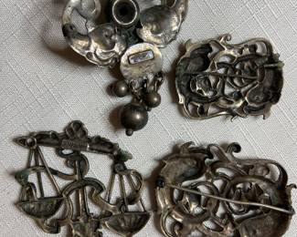 Vintage sterling silver brooches by Cini