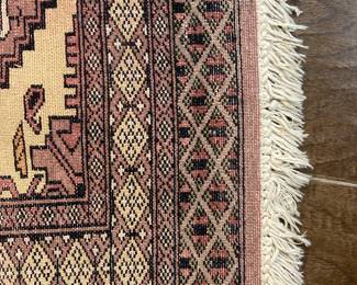 Mauve and black Bokhara rug 36” x 25”