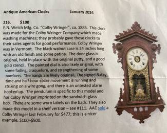 E. N. Welch Mfg Co “Colby Wringer” circa 1883 black walnut case wall clock