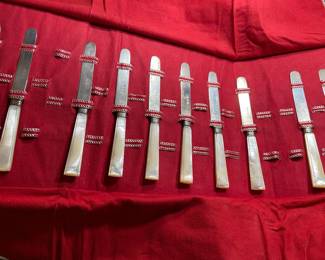 Vintage Mother-of-Pearl handled knives with original tarnish-resistant holder