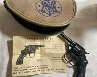 Starter Revolver with original paperwork and holders