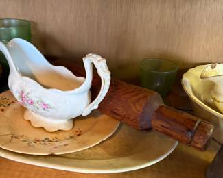 Antique rolling pin and dishes, uranium glass