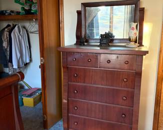 Antique tall chest of drawers with mirror