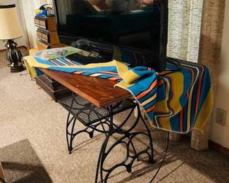 Sewing treadle table