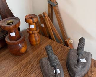 Hand turned candle sticks, antique irons 
