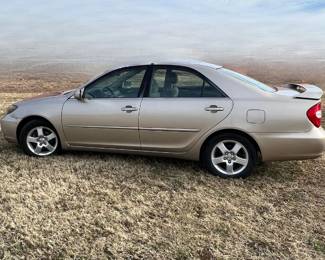 2004 Toyota Camry 4 door SE sedan, manual transmission, 203k miles