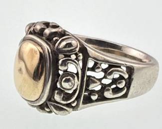 Very attractive sterling, 14kt gold ring