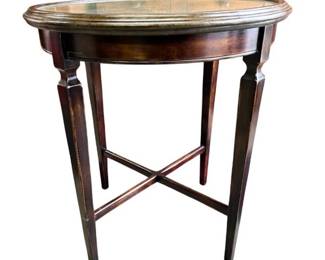 Distressed mirrored round table with X stretcher base