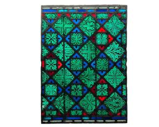 Unusual stained glass panel with reverse painted motifs