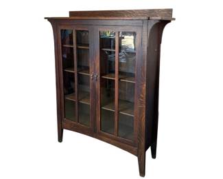 Signed Limberts Arts and Crafts oak bookcase with double glass doors