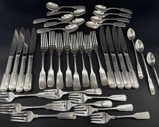 Gorham sterling silver flatware in "Old English Tipt" pattern: eight dinner forks (497g), eight dinner knives, eight salad forks (410g), eight teaspoons (347g), three iced teaspoons (110g), one cream soup spoon (47g). All is NOT monogrammed.