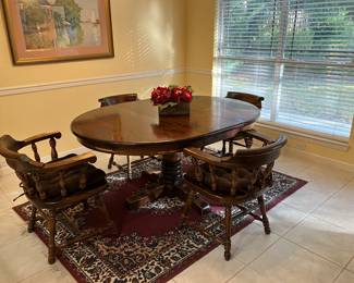 12	380.00	Oval kitchen table with  6 barrel chairs 53 X 48D X 29H Incl. 1 x15" Leaf
