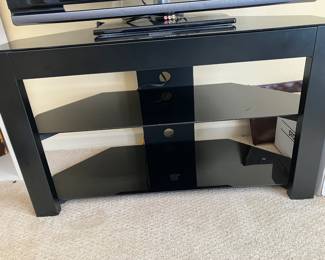 29	100.00	Dark Glass TV  Stand 40W X 14D X 24H
