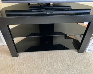 29	100.00	Dark Glass TV  Stand 40W X 14D X 24H
