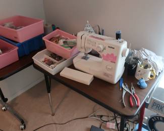 Brother sewing machine and notions There are two small tables also