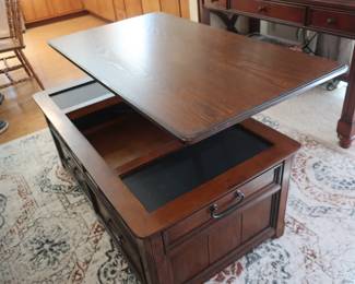 storage view of table as lid raises up