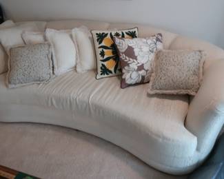 off white curved sofa