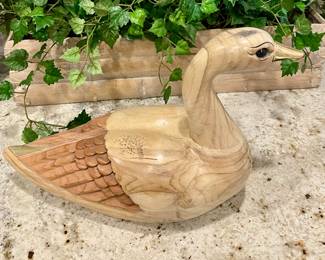 CARVED DUCK WITH BRASS BILL AND TAIL FEATHER