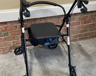 ROLLATOR WITH STORAGE SEAT