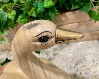 CARVED DUCK WITH BRASS BILL AND TAIL FEATHER