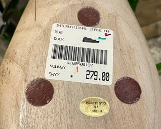 CARVED DUCK WITH BRASS BILL AND TAIL FEATHER