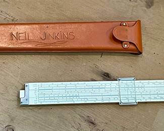 VINTAGE SLIDE RULE IN LEATHER CASE