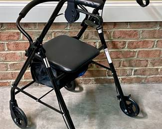 **LIKE NEW  -  ROLLATOR WITH UNDER SEAT STORAGE 