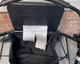 ROLLATOR WITH STORAGE SEAT