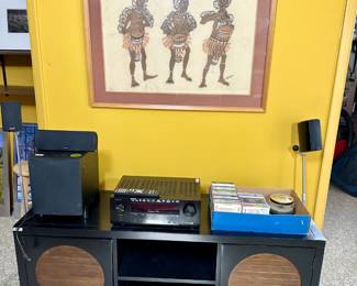 entertainment center, definitive standing speakers, CDs, 