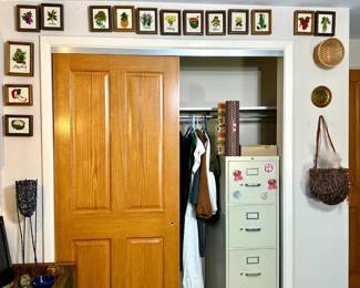 framed stitched art, file cabinet