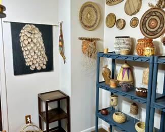 various woven baskets, side table, art