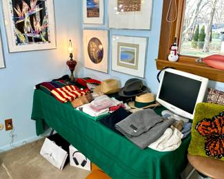 clothing and framed art, Prada, Louis Vioutton, and Apple - boxes and bags
