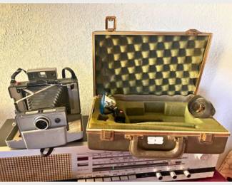 Vintage Polaroid camera with case and accessories