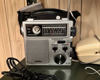 Look at this radio, there is a case for it hiding behind it with the manuel