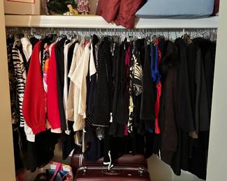 More clothing and set of 2 burgundy hardcover suitcases