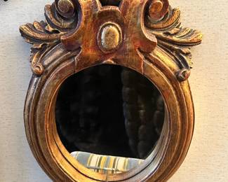 This mirror will look amazing on a photo wall, just the right size