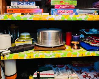 Great games on the top shelf, some vintage kitchen on the middle shelf, and yep you guessed it more Christmas on the bottom shelf. But these are Christmas tree storage bags and plastic haul away bags for the fresh trees