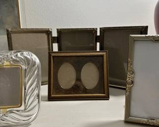 Tons of picture frames...glass, brass, wood, and ceramic frames