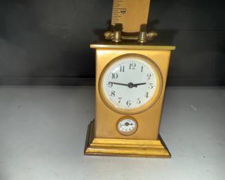 Waterbury Clock, needs to be tightened, it is loose. Has two screws out $55.00
