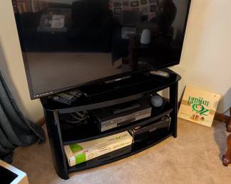 Philips TV, Wii game system, Wii Fit Plus, DVD/VHS player