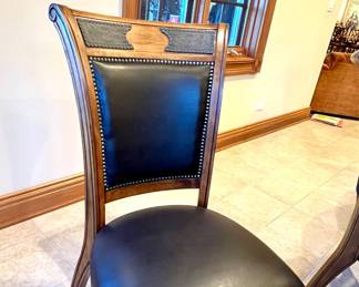 16 Leather and wood chairs,  can be sold separately - 2 arm chairs, 14 side chairs 