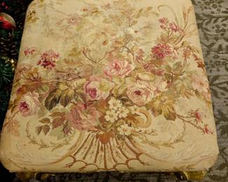 Beautiful tapestry on foot rest