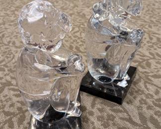 Murano Glass sculptures of boy and girl children by Italian artist Lorendano Rosin [1936- 1992]. Both are  12" tall. With black marble square pedestals,  signed by artist , MCM 