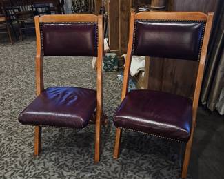 2 chairs that are replicas of Titanic chairs